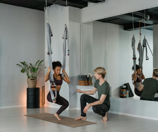 An instructor guiding a small group through a series of movements.